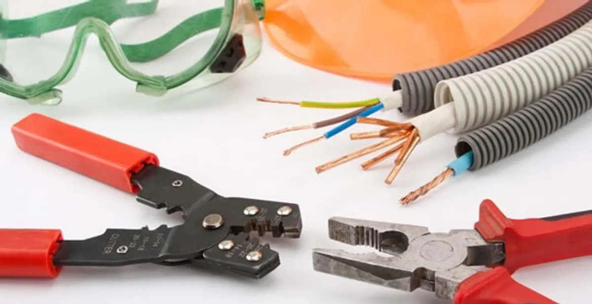 Electrical wiring repair with professional tools and safety equipment in Aurora, CO