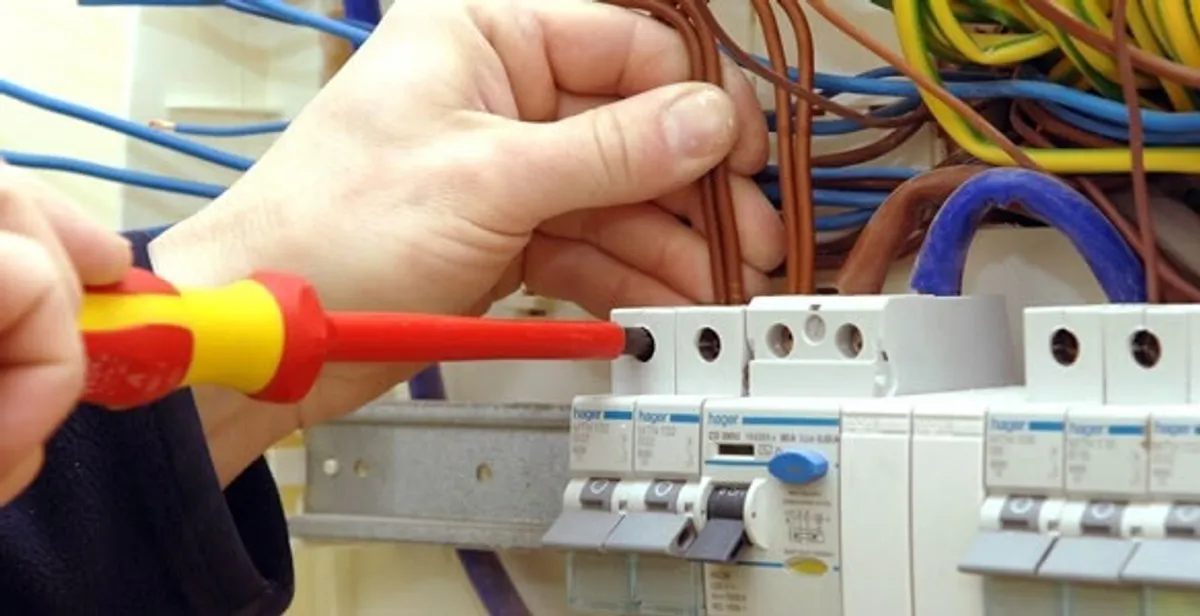 electrician services performing professional electrical panel wiring and connections in Littleton, CO