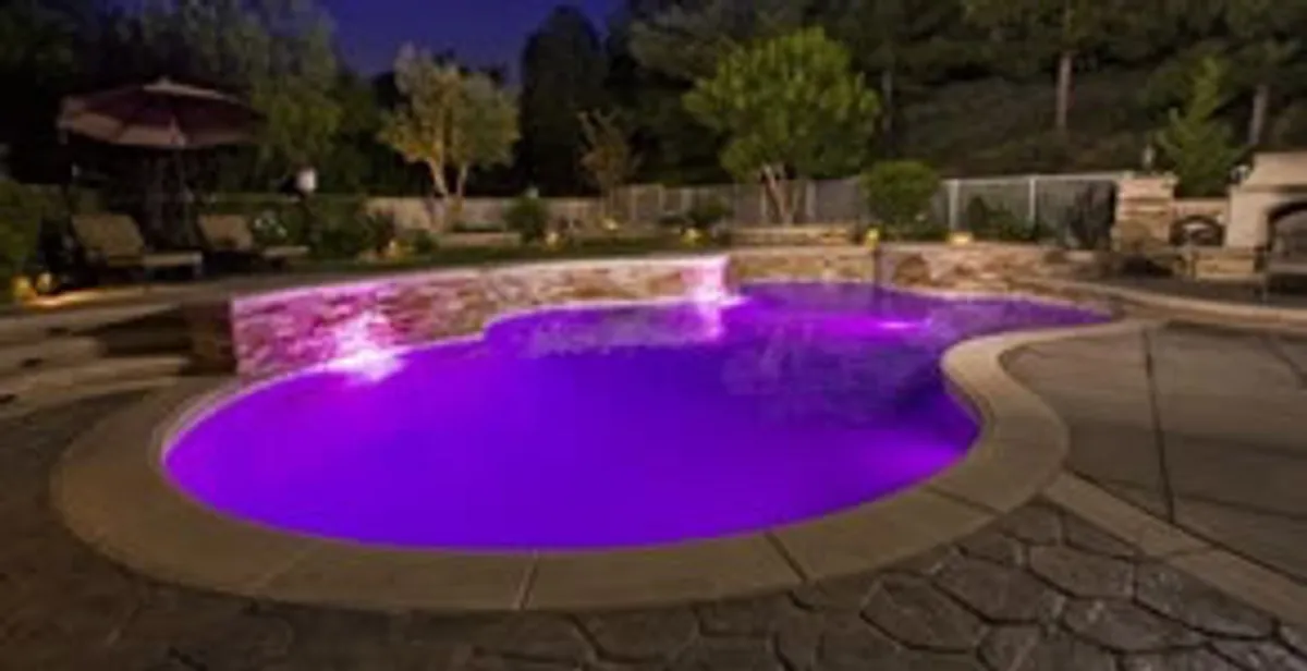 pool light installation and repair services illuminating a residential swimming pool in Littleton, CO