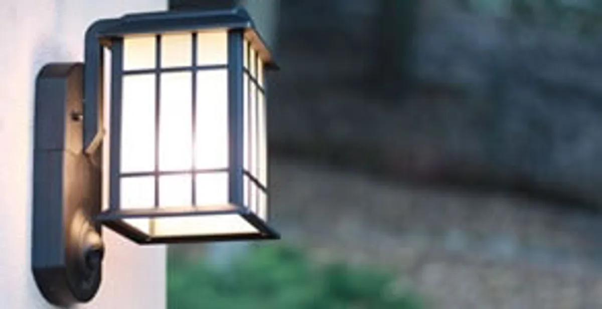 security light installation services with professionally mounted exterior wall light in Littleton, CO